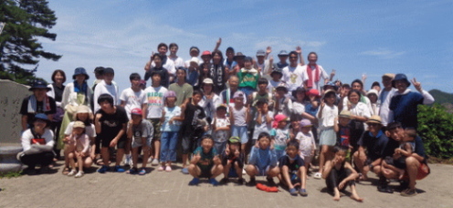 青谷こども学園との地引網交流